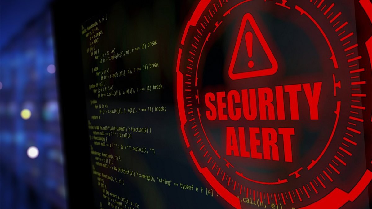 Alerta de segurança vermelho sobre linhas de código em um monitor